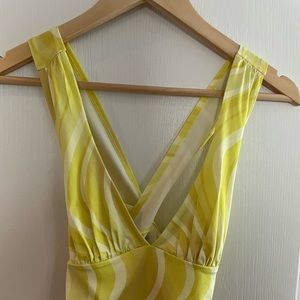 New with tags Urban Outfitters yellow crop tank top. Tie back